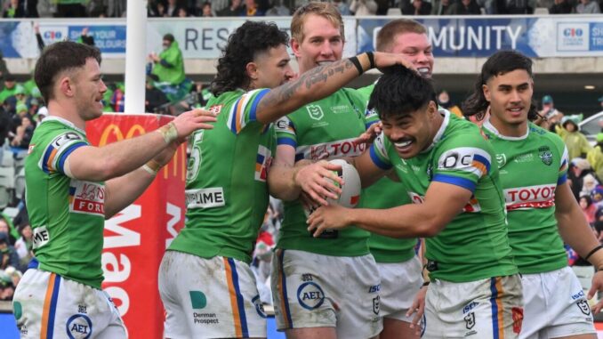 Canberra, Australia. 27th July, 2025. Raiders players celebrate after Matthew Timoko scores a try during the NRL Round 21 match between the Canberra Raiders and the Newcastle Knights at GIO Stadium in Canberra, Sunday, July 27, 2025. (AAP Image/Mick Tsika